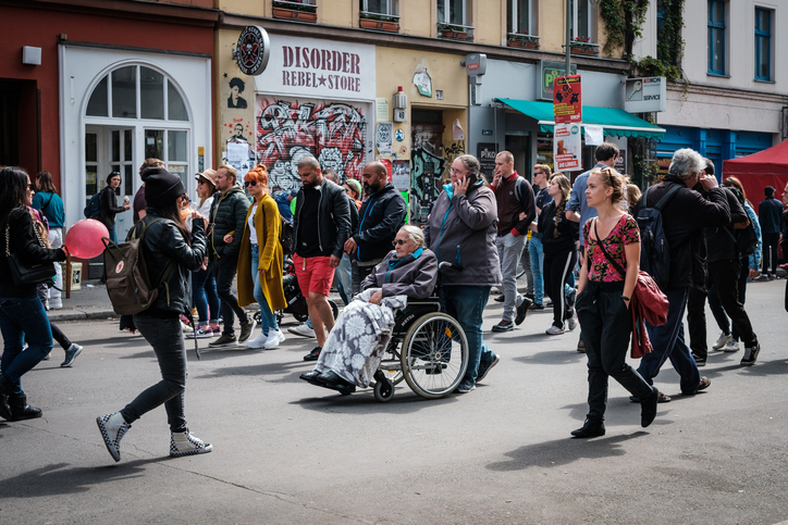 Many people on crowded street on labor day in Berlin, Kreuzberg