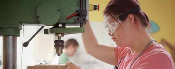 woman working in wood MAIN