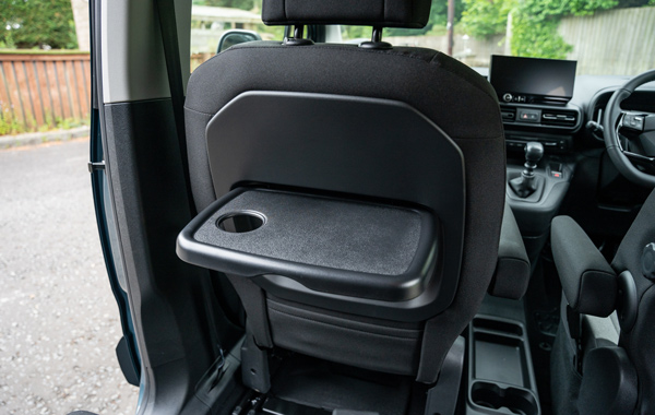 folding tray at back of front seat