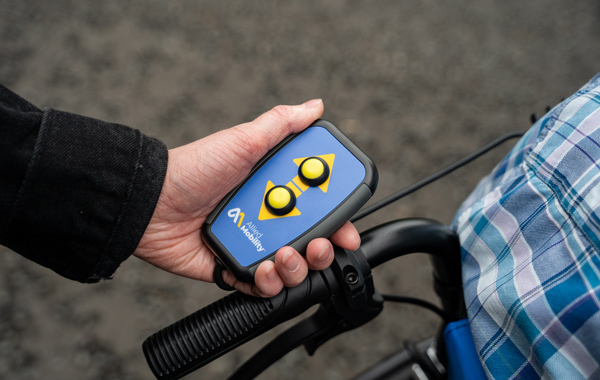 electric winch control in a person's hand