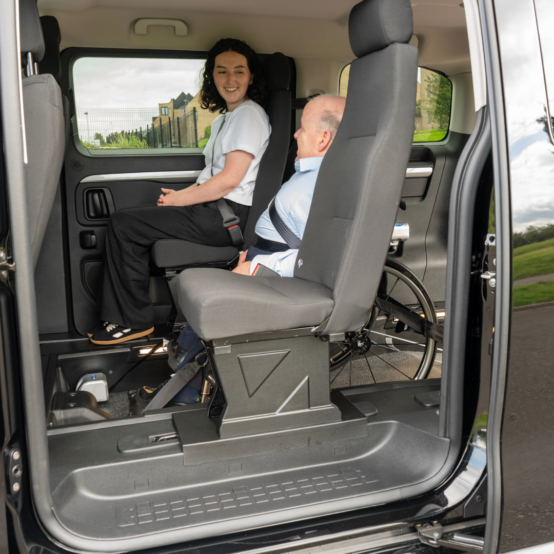Vaxuhall Venture row two with wheelchair user and passenger