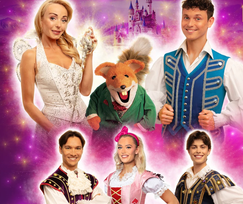 Five smiling actors in colourful fairy tale costumes and a puppet mouse, set against a pink and purple backdrop with a magical castle in the distance. Representing cinderella panto in Richmond. Image Credit: ATG Tickets page.