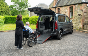 An Accessible Guide to Glasgow 2026” graphic featuring an accessible vehicle with ramp, wheelchair users, athletes, and Glasgow 2026 branding on a blue background.