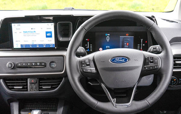 Close‑up view of the Ford Valeso steering wheel and digital instrument display.